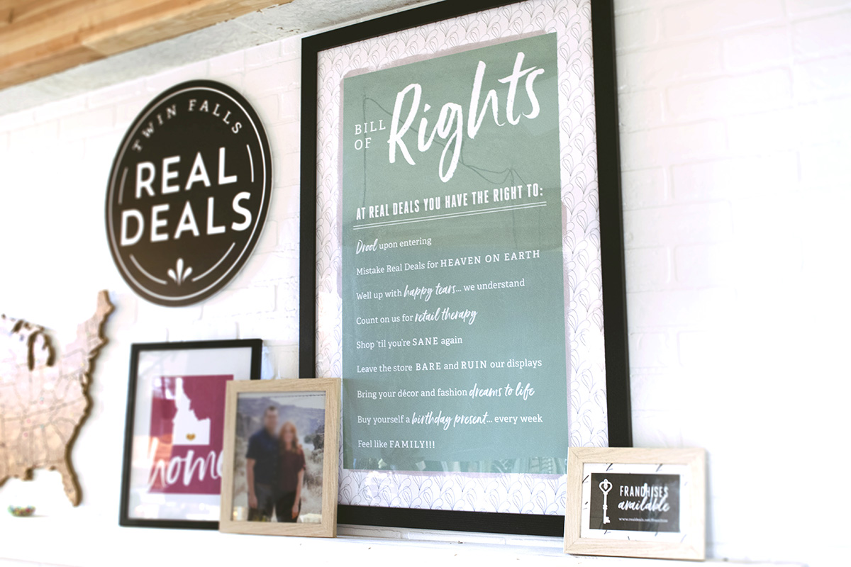 Cash wrap wall with framed prints